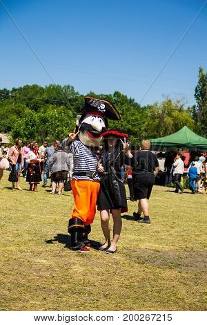 Couple Dressed In Pirate Costumes During Strawberry Festival