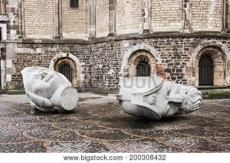 BONN, GERMANY - FEBRUARY 21, 2016: Sculptures depicting the heads of Saints Cassius and Florentius in front of the Bonn Minster Bonn Germany