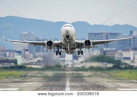 Airplane taking off from the Itami International Airport.