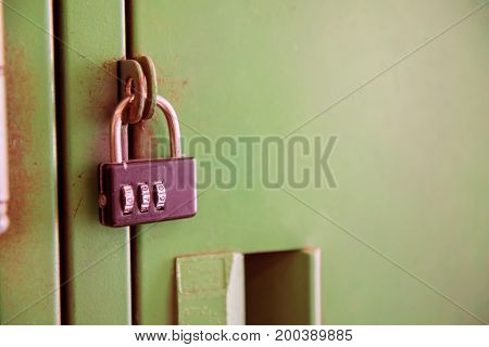 Old lock on the Locker. lock on the door of an old Locker vintage style close-up focus on lock.