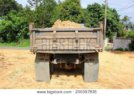 Dump Truck Of  Soil At Construction Site