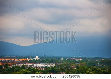 The Mountain And The City In Cloudy Weather. Kuching, Borneo, Sarawak, Malaysia