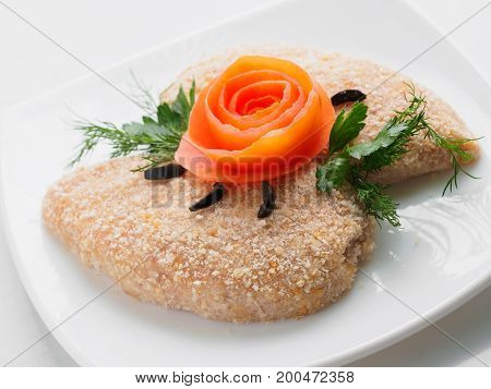 Raw Semifinished Cutlet With Greens On A Plate. Isolated