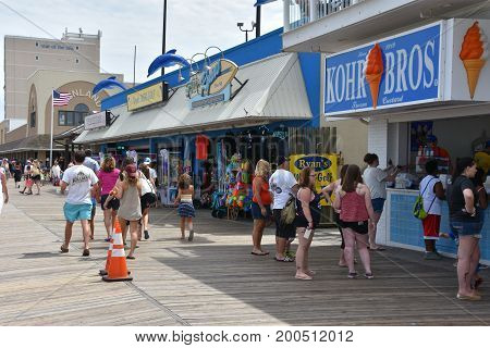 REHOBOTH BEACH, DELAWARE - JUL 1: Boardwalk at Rehoboth Beach in Delaware, as seen on July 1, 2017. It is a popular regional vacation destination.