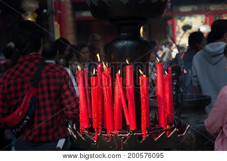 Taipei Taiwan - March 20 2015: Buddhists praying in Longshan temple