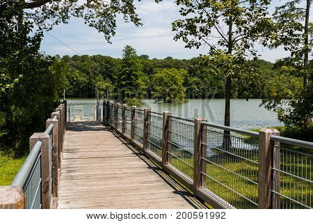 Ramp to ADA-compliant canoe/kayak launch ramp at Stumpy Lake Natural Area in Virginia Beach, Virginia.