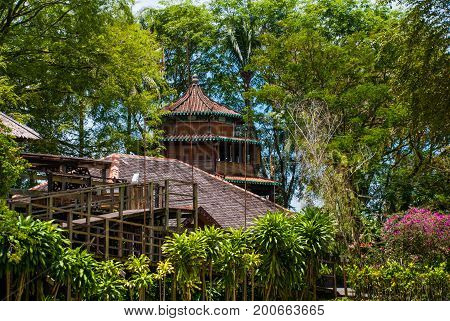 Traditional Wooden Houses In The Kuching To Sarawak Culture Village. Malaysia