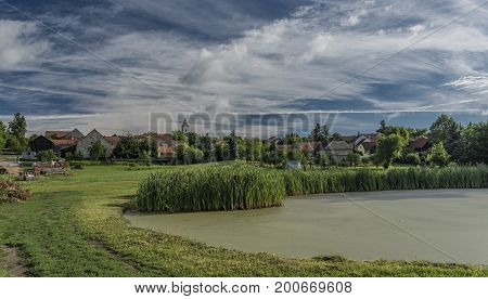 Pond in Lukov village in summer sunny color nice morning