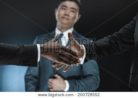 Multiethnic Business Partners Shaking Hands