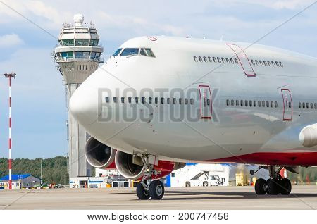 Nose Cockpit Pilot Of Airplane On The Runway At The Airport Atc Tower