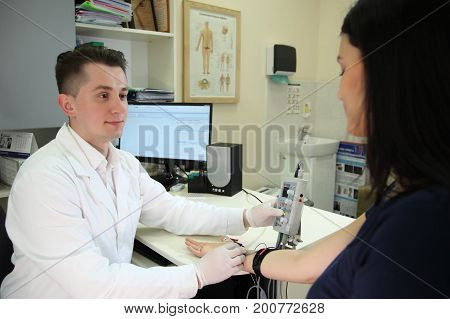 VINNITSA, UKRAINE, JULY 27, 2017: A new direction in medicine is electroneuromyography. Medical examination ELECTROMYOGRAPHY.