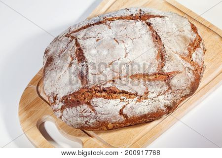 Homemade rye bread on a cutting board