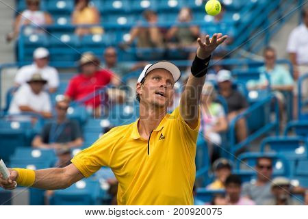 Mason Ohio - August 15 2017: Tomas Berdych in a first round match at the Western and Southern Open tennis tournament in Mason Ohio on August 15 2017.