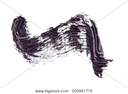 Brush strok of black shade of mascara on white