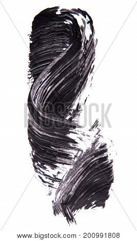 Brush strok of black shade of mascara on white