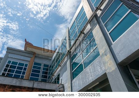 Denpasar/bali-march 27 2019: The Building With Glass Windows Uses A Little Balinese Ornament On The