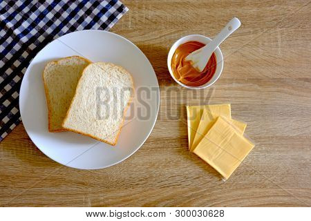 Bread Slide On White Plate And Cheese Peanut Butter