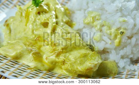 Aji  De Gallina -  Peruvian Chicken Stewand Aji Amarillo Peppers,served With Boiled Rice
