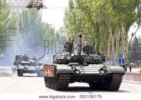 Donetsk, Donetsk People Republic, Ukraine - May 9, 2019: Armored Soviet Tanks T-72 Driving Through T