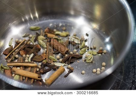 Close-up Of A Variety Of Spices In Metal Bowls For Making Masa Tea In A Yoga Studio