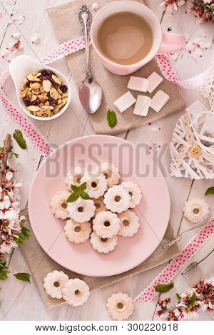 Canestrelli Biscuits With Mint On Wooden Table.