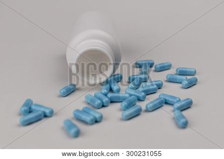 Close Up View Of Generic Blue Pills. Opiate And Heroin Overdoses Have Skyrocketed In Recent Years Iv