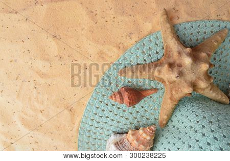 Menthol Color Hat Lies On The Sand