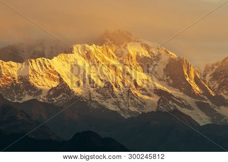 Sunset On Chaukhamba Peaks, A Mountain Massif In The Gangotri Group Of The Garhwal Himalaya. It Lies