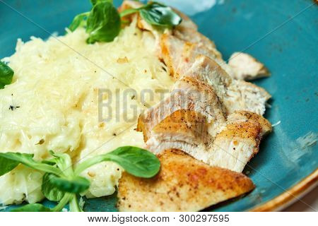 White Rice With Chicken Breast. Rizotto. Gray Light Textured Background. Beautiful Serving Of Dishes