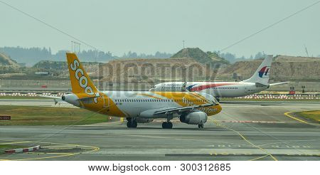 Singapore - Mar 28, 2019. 9v-tro Scoot Airbus A320 Taxiing On Runway Of Singapore Changi Airport (si