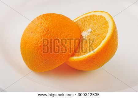 Fresh Slised Oranges Isolated On The Gray Background