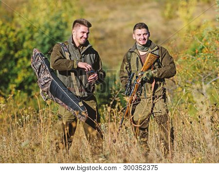 Man Hunters With Rifle Gun. Boot Camp. Hunting Skills And Weapon Equipment. How Turn Hunting Into Ho