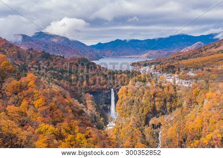 Beautiful Waterfall In Autumn Forest From Top View.