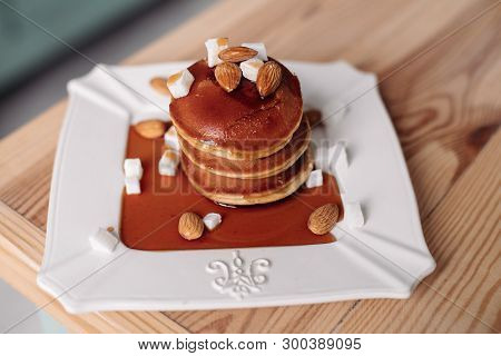 Delicious Homemade Pancakes With Chocolate Syrup. Concept Of Dessers And Sweets.