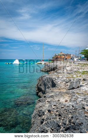 Montego Bay, Jamaica - March 20 2018: Tourists Enjoying Water Trampoline Activities On Sunny Summer 