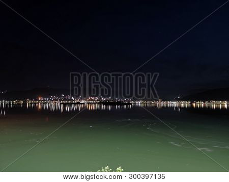 City Lights Reflection In The Water - Danube River - Orsova.