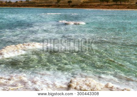 Crystal Sal Beach On Dead Sea Coast, Israel. The Dead Sea Surface And Shores Are 430.5 M Below Sea L