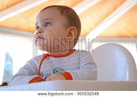 Cute Beautiful Plump Baby Thinks About Something