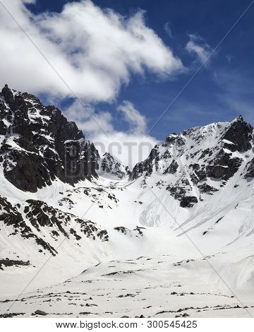 Snowy Sunlit Mountains With Traces From Avalanche And Blue Cloudy Sky In Winter Day. Turkey, Kachkar
