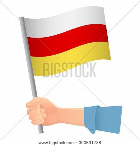 South Ossetia Flag In Hand. Patriotic Background. National Flag Of South Ossetia Vector Illustration