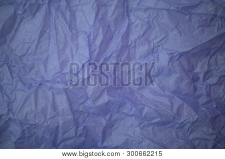 Background Made Of Violet Crumpled Paper Fot Copy Space