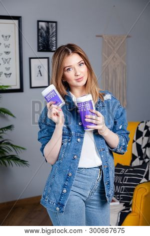 Russia Kemerovo 2019-04-15 Beautiful Caucasian Young Girl In Jeans Jacket Hold Makeup Cleaning Wipes