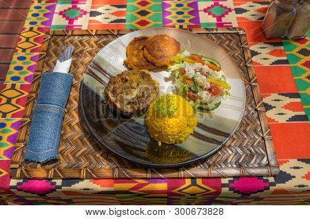 Traditional African Cuisine Bobotie Mince With Rice And Salad. Ethnic Local Cuisine, Food Served On 