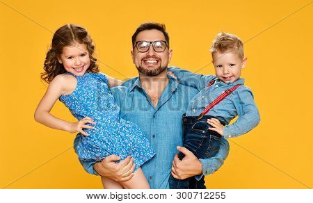 Happy Father's Day! Children Daughter And Son Congratulates Dad On Yellow