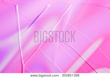 Vaporwave Style Texture Background: Neon Pink Funky Paint Texture.