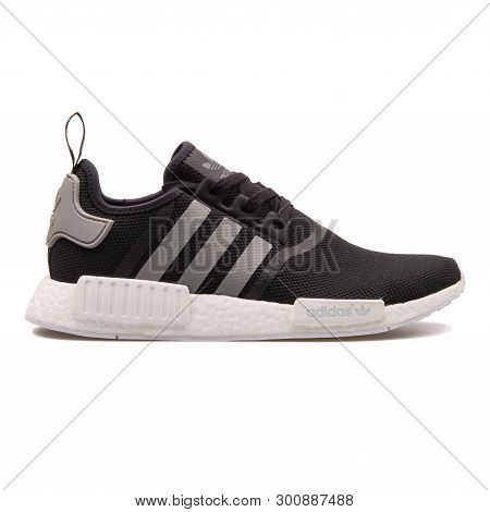 Vienna, Austria - August 30, 2017: Adidas Nmd R1 Black And Grey Sneaker On White Background.