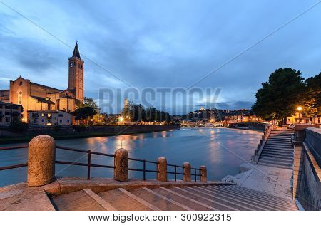 Panoramic View On The Dige River In The Evening In Verona. Italy