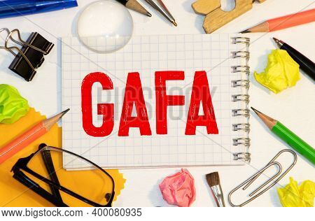 The Word Gafa Written In Sketchbook On Wood Board. It Is Located On The Center.