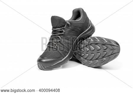 Black Sneakers Isolated On White Background. Black Sneakers Running Shoes. Casual Shoes. Youth Style