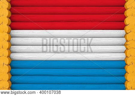 National Flag  Of Luxembourg On A Wooden Wall Background. The Concept Of National Pride And A Symbol